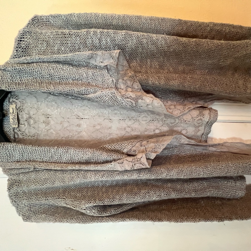 Lucky Brand sweater size XS.  Open front lace on the back . Grey/silver